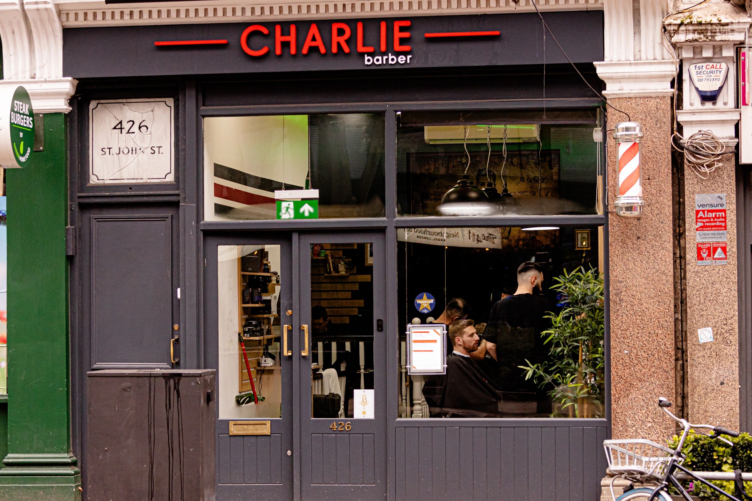 Charlie Barbers at 426 St. John Street, with its distinctive red Charlie sign